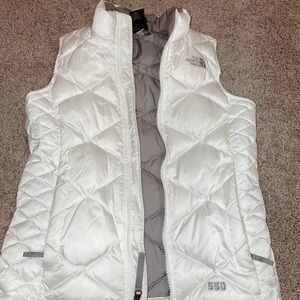 A gently worn women’s white North Face Vest.